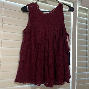 Lacy maroon sleeveless blouse